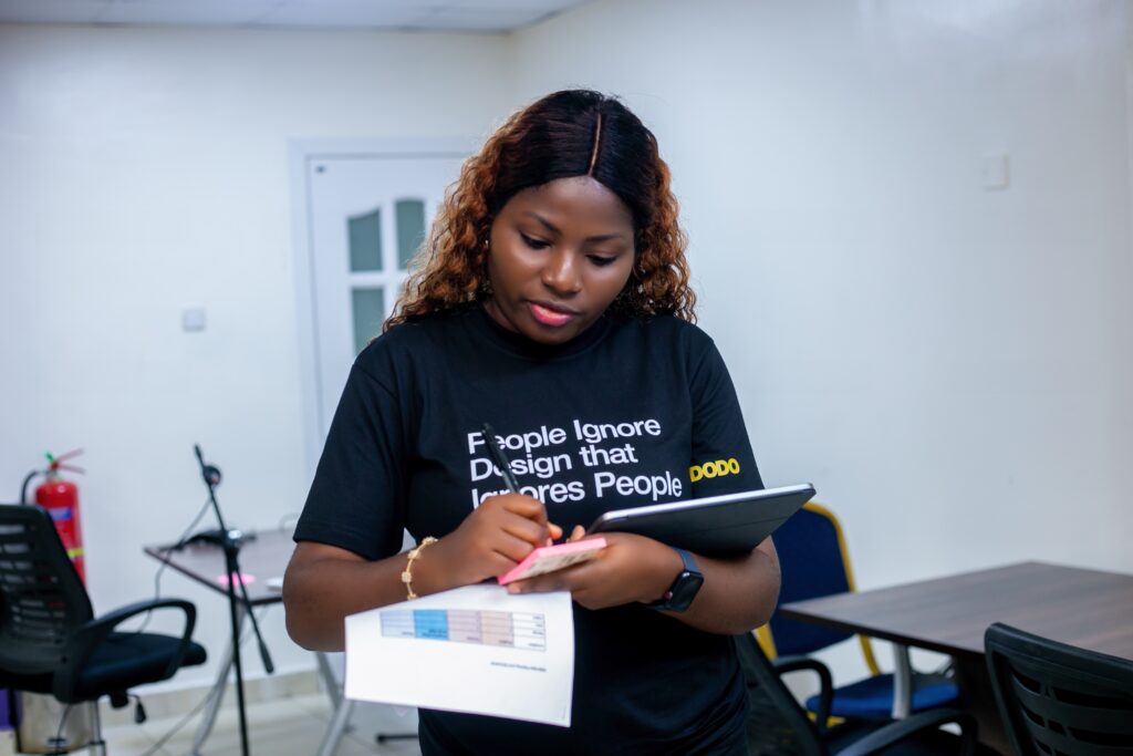 Aderonke documenting during human centered projects